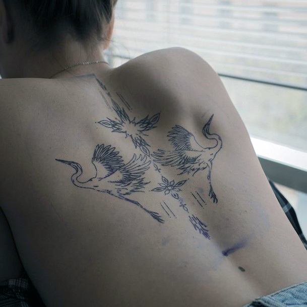 Female Cool Crane Tattoo Design