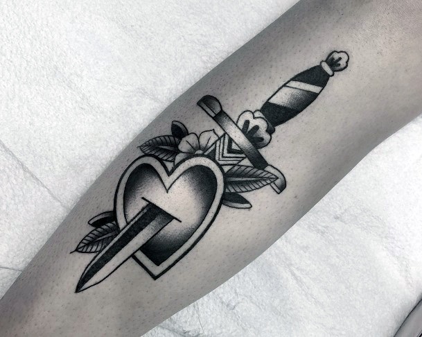 Female Cool Dagger Heart Tattoo Design