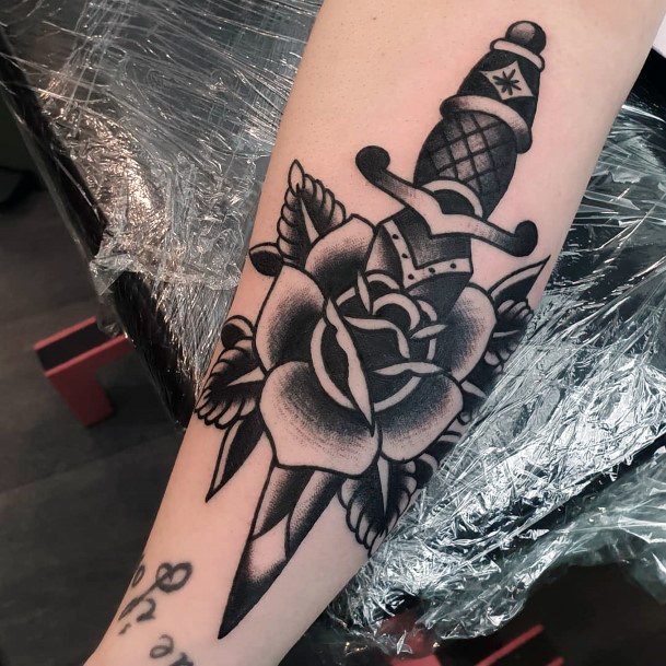 Female Cool Dagger Rose Tattoo Design