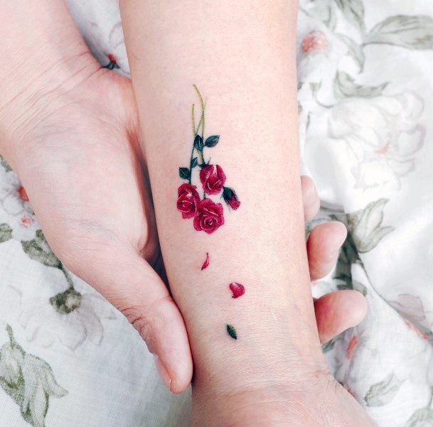 Female Cool Flower Petal Tattoo Design