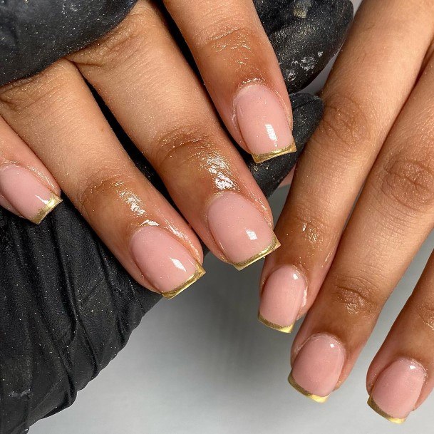 Female Cool Gold French Tip Nail Ideas