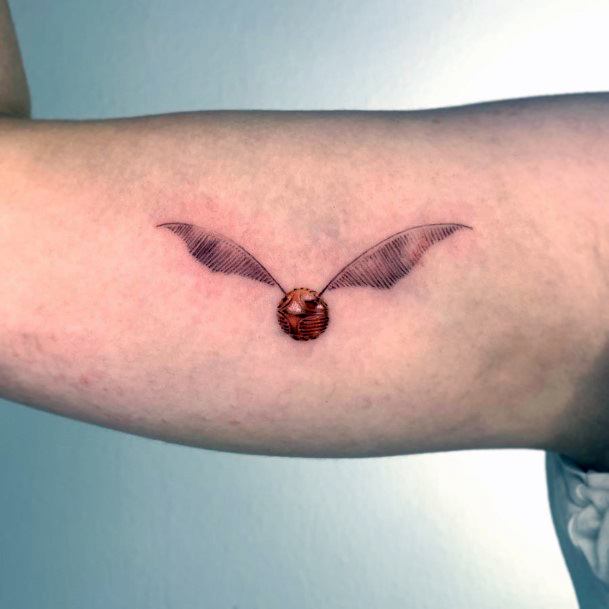 Female Cool Golden Snitch Tattoo Design