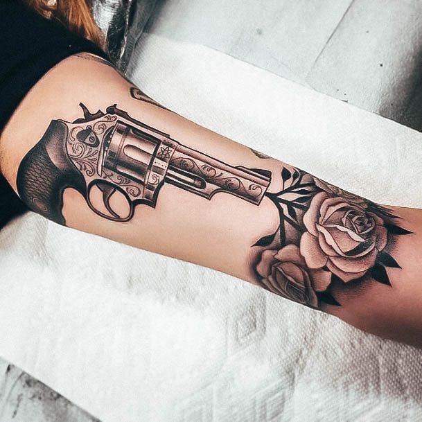 Female Cool Gun Tattoo Design