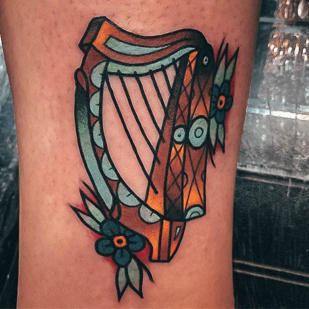 Female Cool Harp Tattoo Design