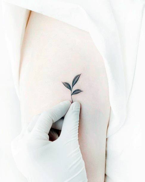 Female Cool Leaf Tattoo Design