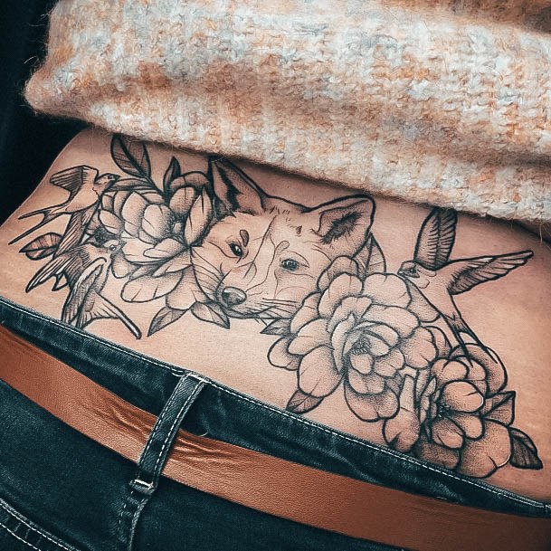 Female Cool Lower Back Tattoo Design