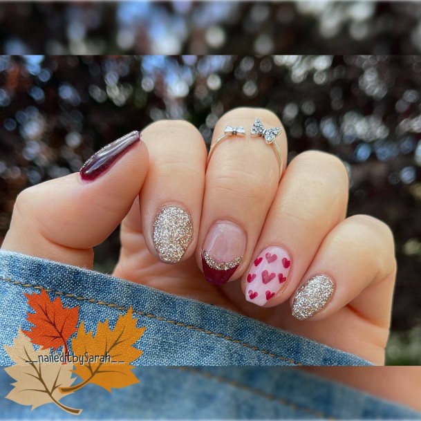 Female Cool Maroon And Silver Nail Design