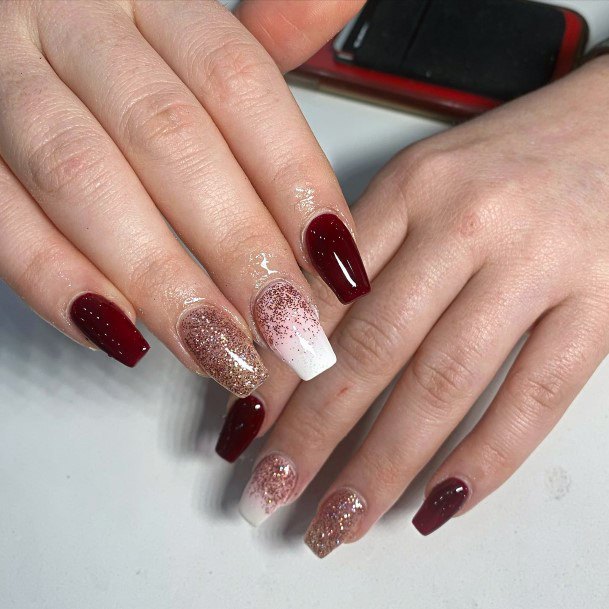 Female Cool Maroon White Nail Design