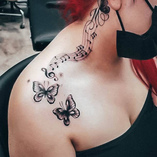 Female Cool Music Note Tattoo Design
