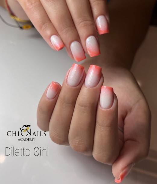 Female Cool Orange And White Nail Design