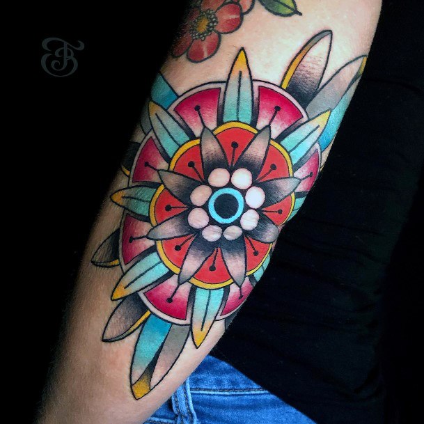 Female Cool Pin Wheel Tattoo Design