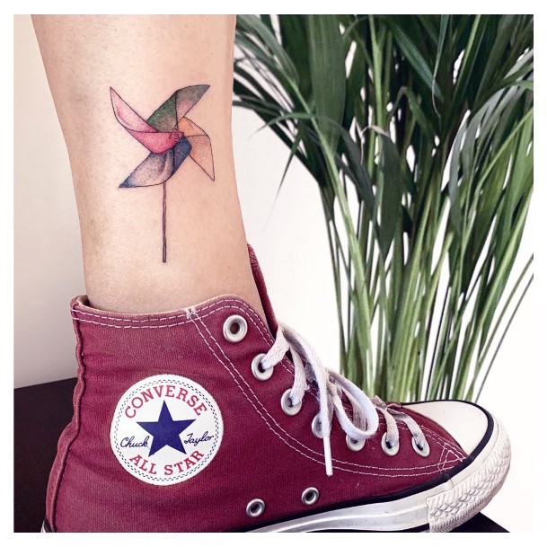 Female Cool Pin Wheel Tattoo Ideas