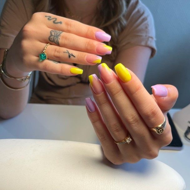 Female Cool Purple And Yellow Nail Design