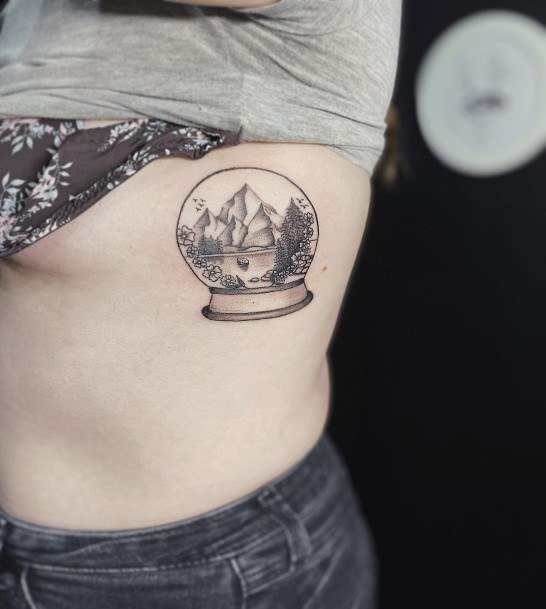 Female Cool Snowglobe Tattoo Design