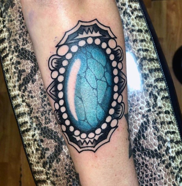 Female Cool Turquoise Tattoo Design