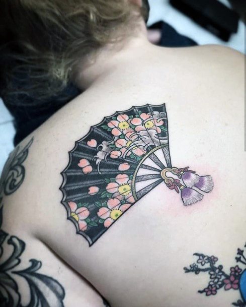 Female Cool Uchiwa Tattoo Design