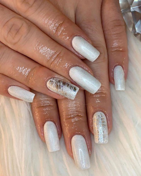Female Cool White And Silver Nail Design