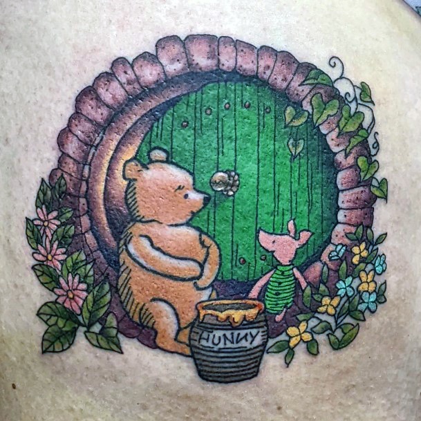 Female Cool Winnie The Pooh Tattoo Design