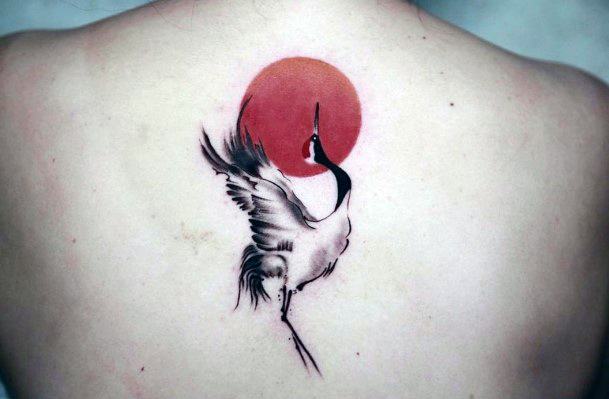 Female Crane Tattoo On Woman