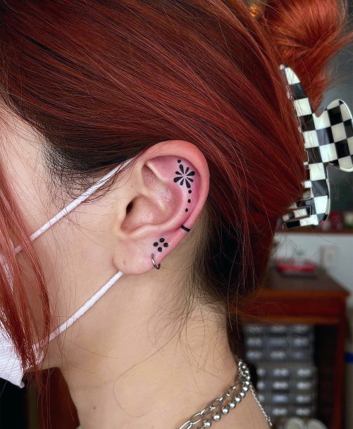 Female Ear Tattoos