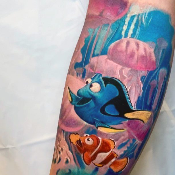 Female Finding Nemo Tattoo On Woman