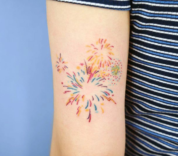 Female Fireworks Tattoo On Woman