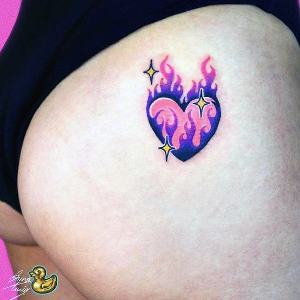 Female Flaming Heart Tattoos