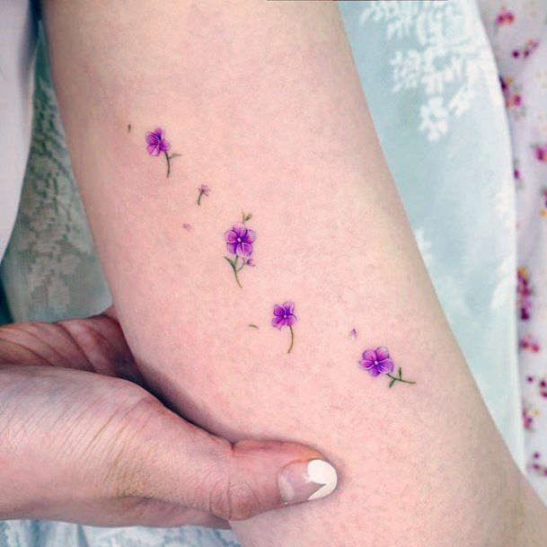 Female Flower Petal Tattoos