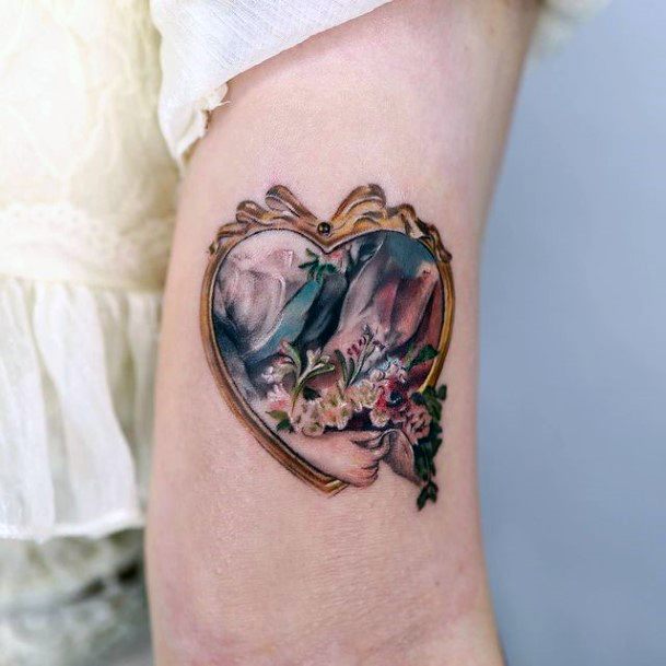 Female Frame Tattoo On Woman