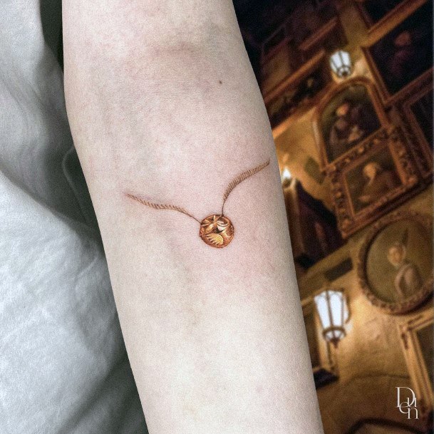 Female Golden Snitch Tattoos