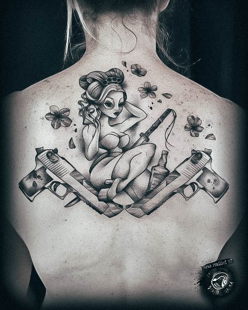 Female Gun Tattoo On Woman