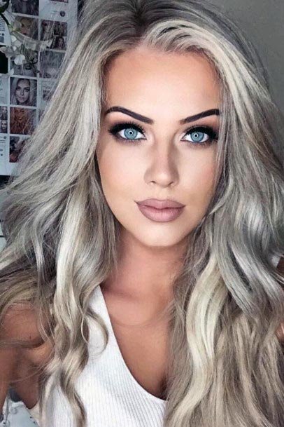 Female Icy Blonde Hair With Wavy Long Layers Side Part