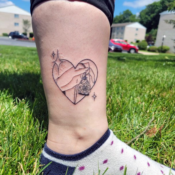 Female Locket Tattoo On Woman