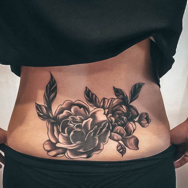 Female Lower Back Tattoo On Woman