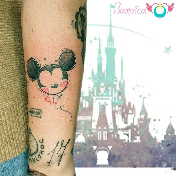 Female Mickey Mouse Tattoo On Woman