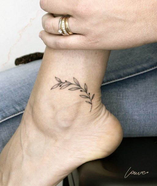 Female Olive Tree Tattoo On Woman