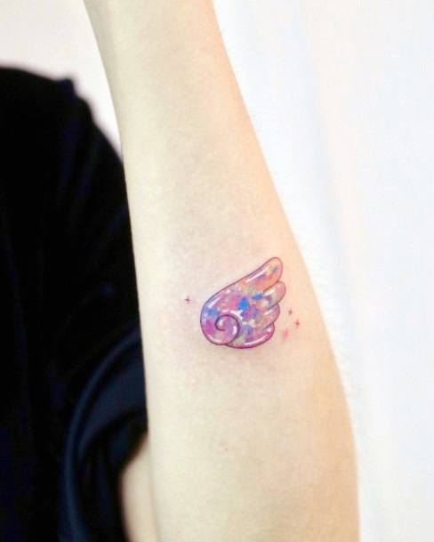 Female Opal Tattoo On Woman