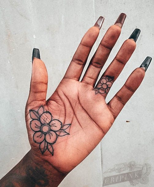 Female Palm Tattoos