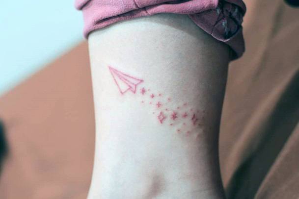 Female Paper Airplane Tattoos