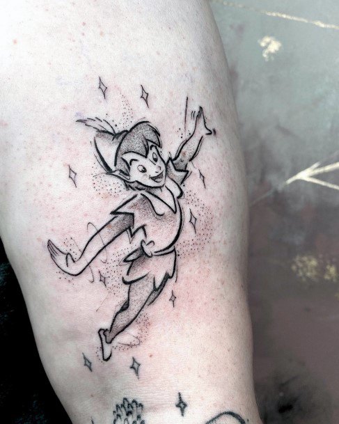 Female Peter Pan Tattoo On Woman