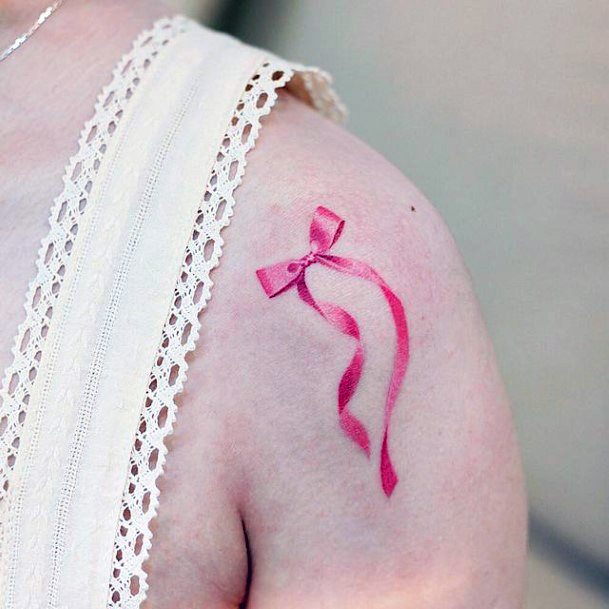 Female Pink Tattoo On Woman