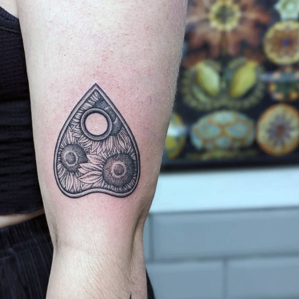 Female Planchette Tattoo On Woman