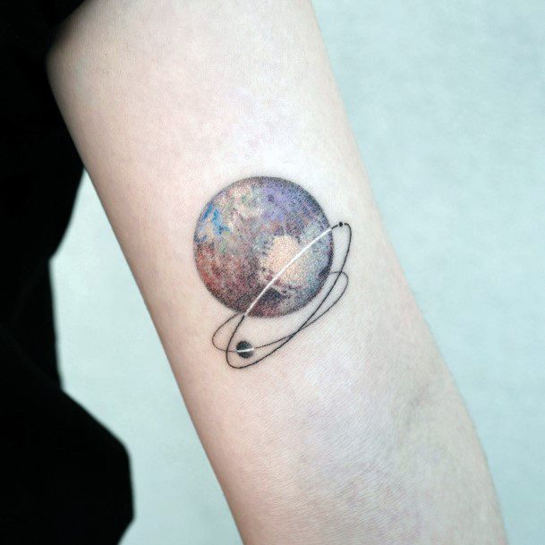 Female Pluto Tattoo On Woman