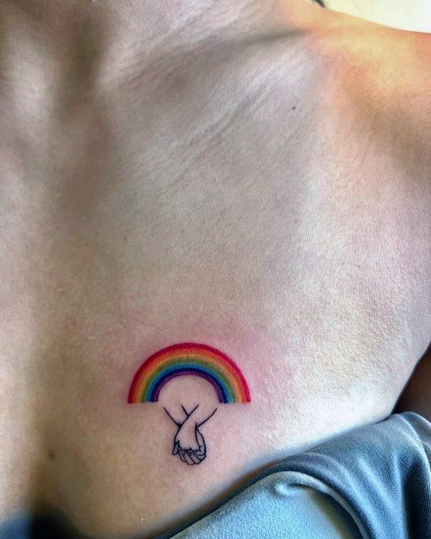 Female Rainbow Tattoo On Woman