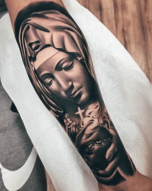 Female Religious Tattoo On Woman