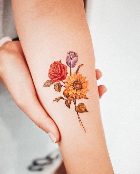 Female Rose Forearm Tattoo On Woman