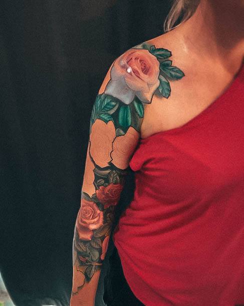 Female Rose Sleeve Tattoo On Woman