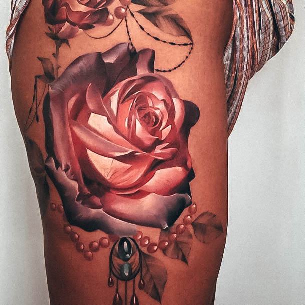 Female Rose Thigh Tattoo On Woman