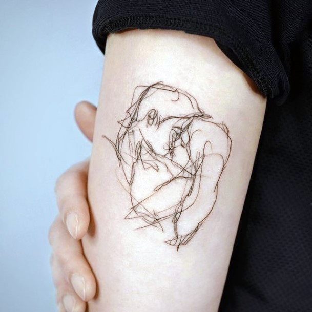 Female Scribble Tattoo On Woman