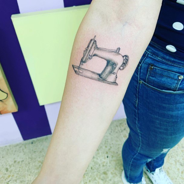 Female Sewing Machine Tattoos